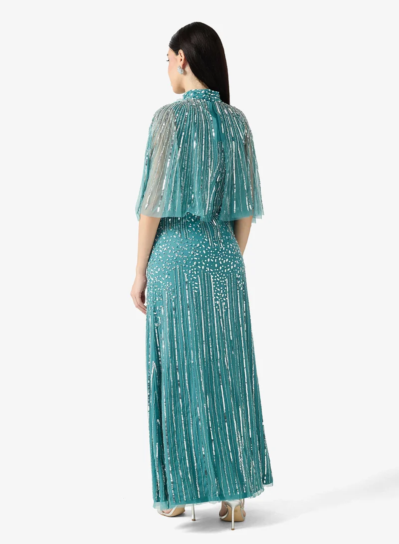 اميليا روز فستان ماكسي مزين بالترتر وأكمام واسعة